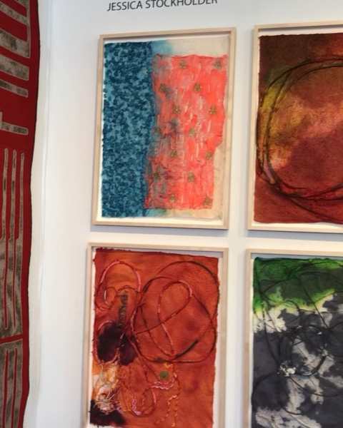 Framed lokta paper works by Jessica Stockholder in blue, coral, red and grey with embedded cords