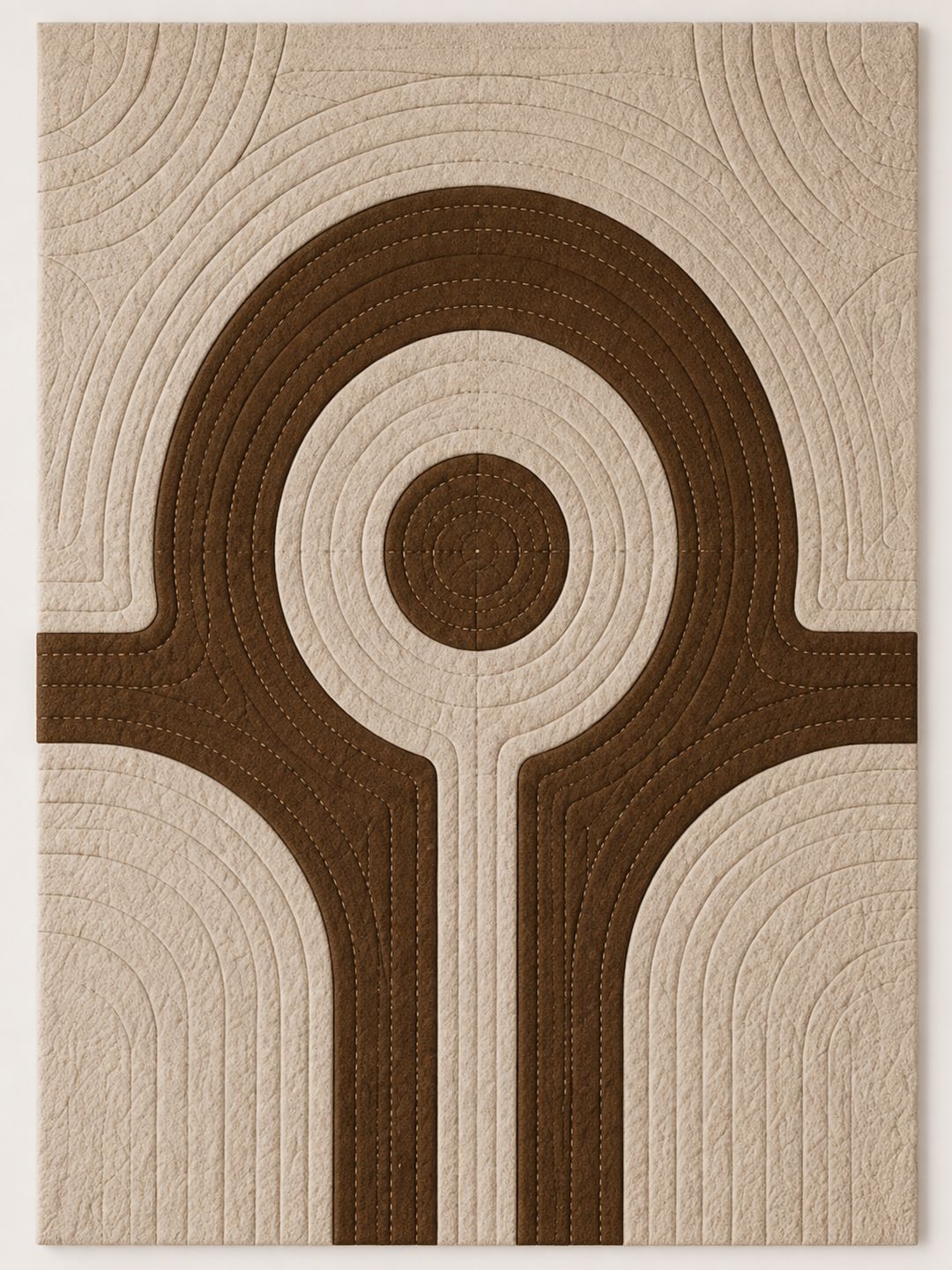 Centre panel of the felt triptych: quilted cream wool with a brown circuit-like figure